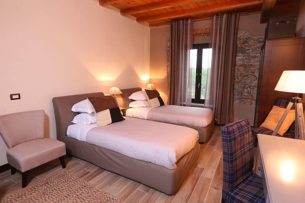 Equirelais Hotel Lomnago Cameră foto